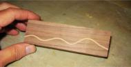 contrasting wood handles 12